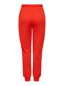 Pantalon de survêtement de couleur - rouge